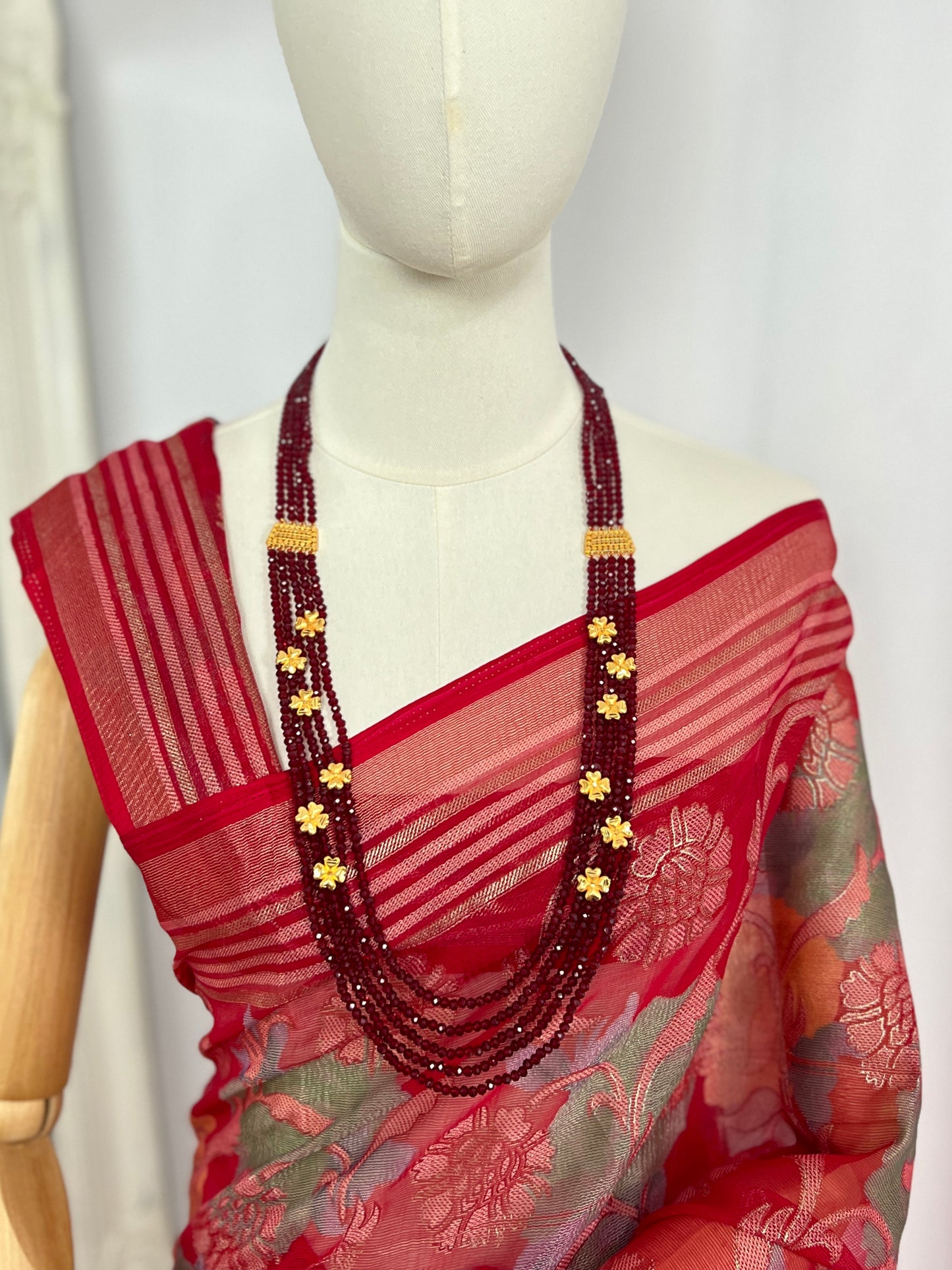 Long Maroon Crystal Necklace with Floral Accents