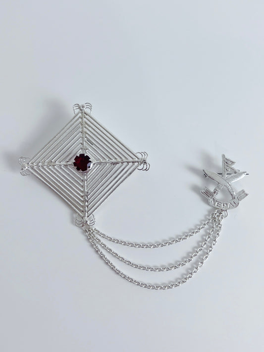 Silam Sakhma & Khukuri Handcrafted Pure Silver Brooch  – Red Stone