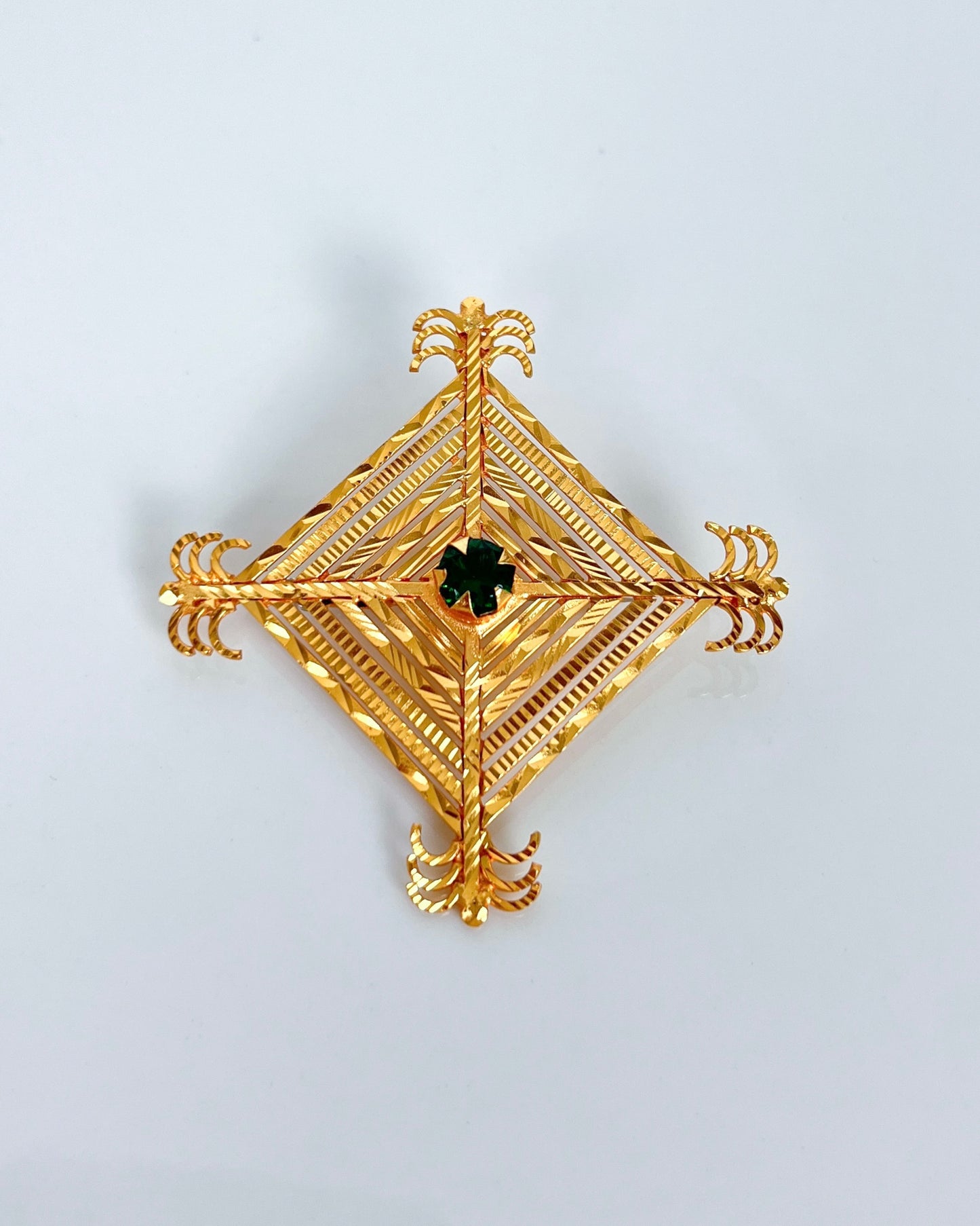 Silam Sakhma Handcrafted Gold Plated Brooch – Emreld Green Stone
