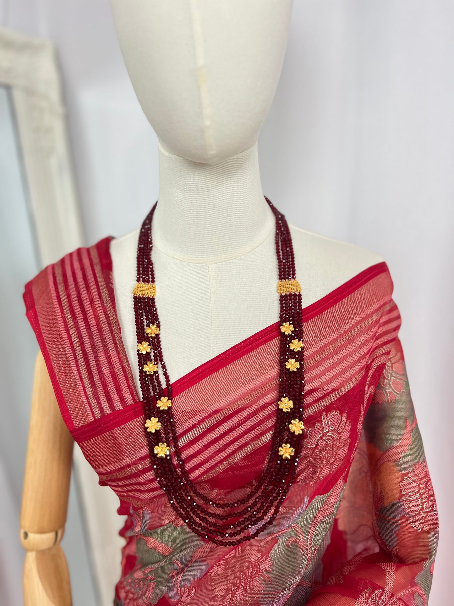 Long Maroon Crystal Necklace with Floral Accents