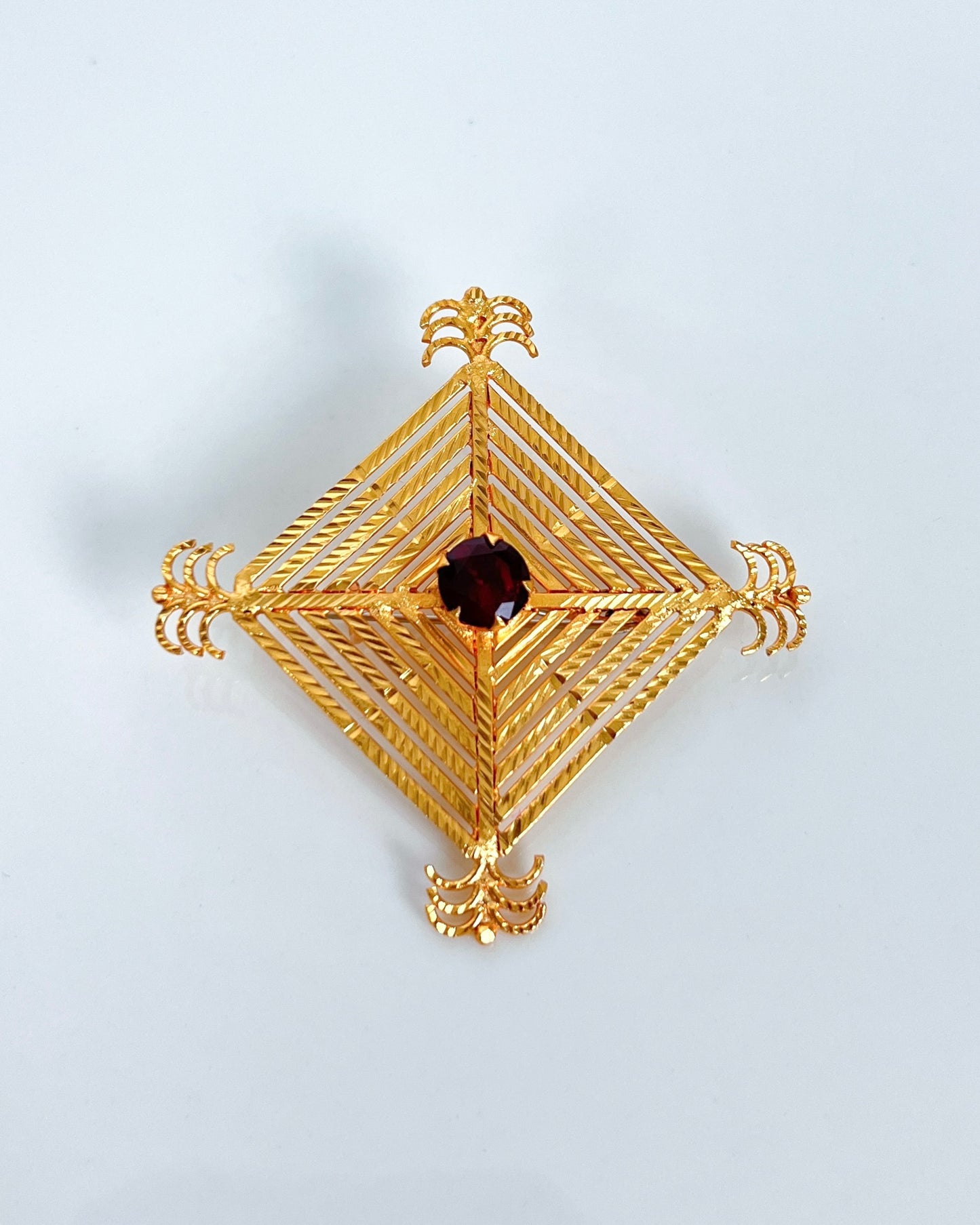 Silam Sakhma Handcrafted Gold Plated Brooch – Maroon Stone