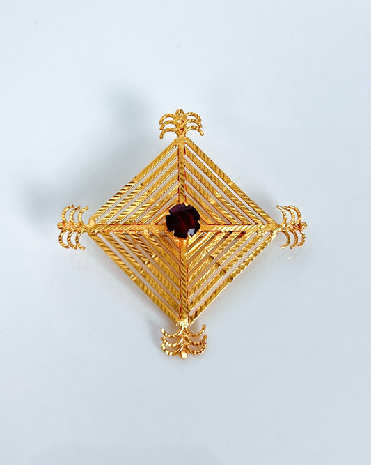 Silam Sakhma Handcrafted Gold Plated Brooch – Maroon Stone